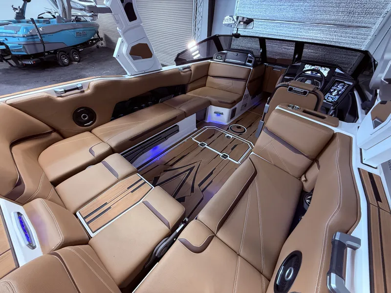 Slide: The Image of 2024 Supra SL 400 interior with luxurious leather seating. - 23