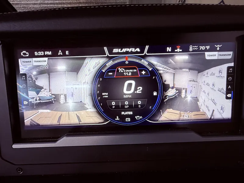 Slide: The Image of 2024 Supra SL 400 dashboard with digital display and rearview camera. - 34