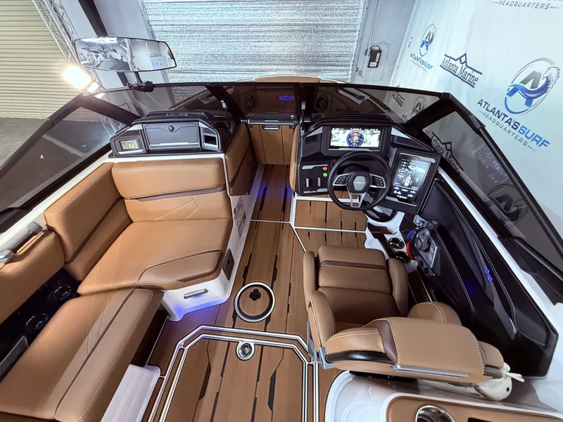 Slide: The Image of 2024 Supra SL 400 interior with luxurious leather seating. - 37
