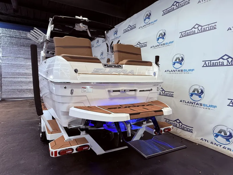 Slide: The Image of 2024 Supra SL 400 boat in Atlanta Marine showroom. - 4