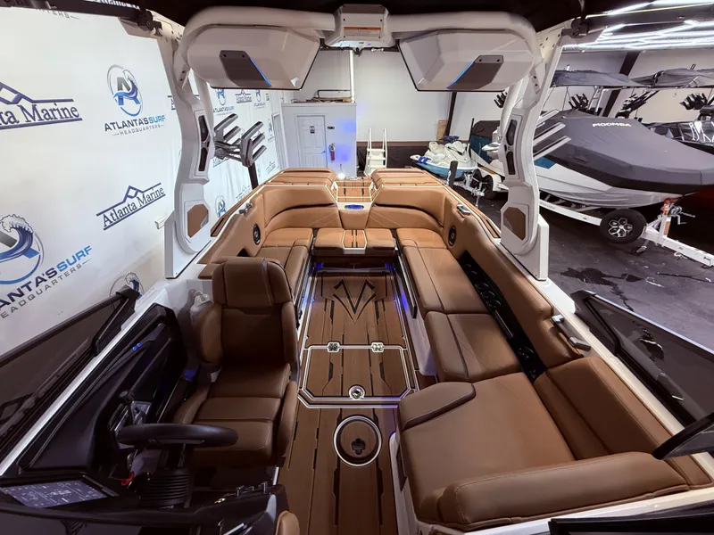 Slide: The Image of Interior of 2024 Supra SL 400 boat with luxurious leather seating. - 40