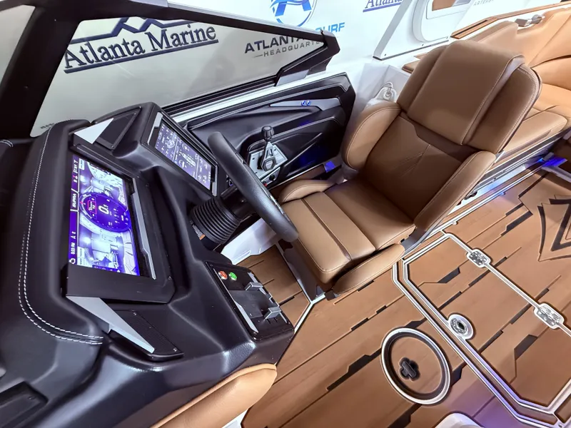 Slide: The Image of Interior of 2024 Supra SL 400 with modern cockpit and leather seating. - 41