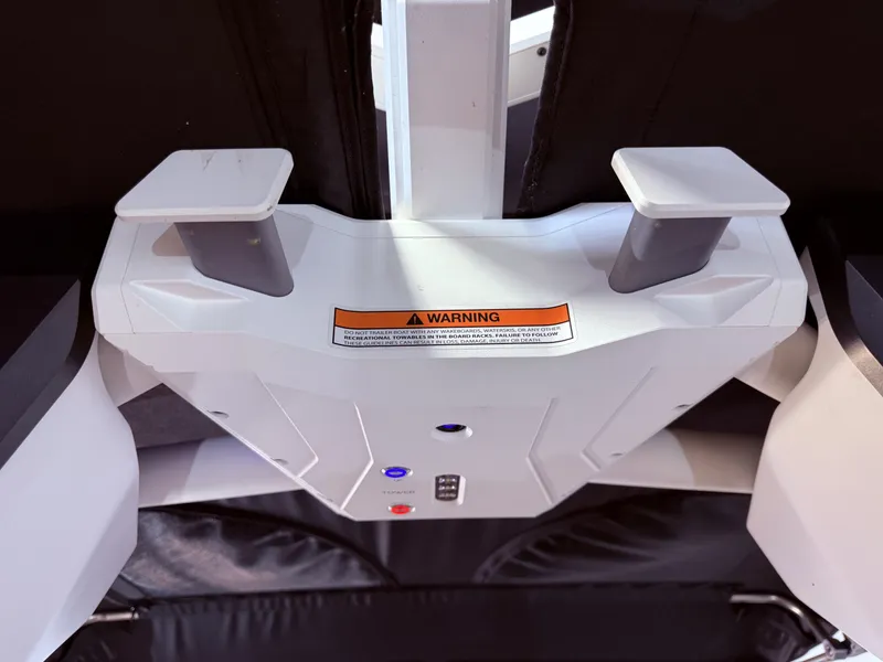 Slide: The Image of Interior view of 2024 Supra SL 400 with warning label. - 44