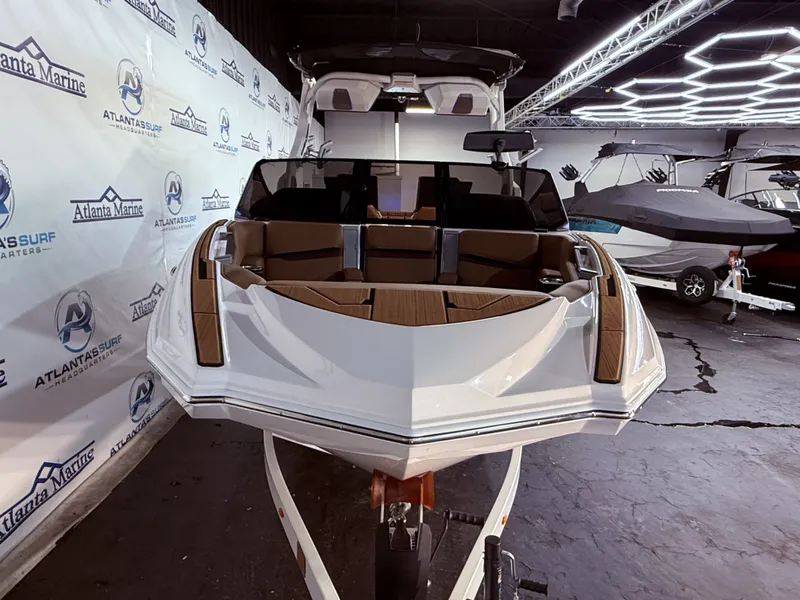 Slide: The Image of 2024 Supra SL 400 boat in showroom at Atlanta Marine. - 9