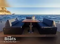 Slide: The Image of 2024 Solaris Power 48' Lobster yacht with ocean view and outdoor seating area. - 9