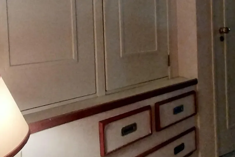 Slide: The Image of Interior cabinetry of 1976 Bertram 58 Flybridge Motor Yacht with drawers and cupboards. - 29