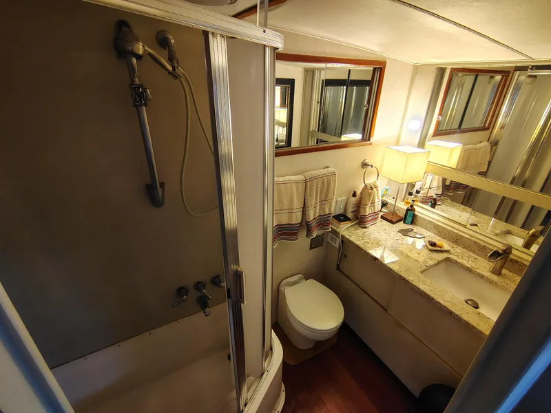 Slide: The Image of Bathroom interior of a 1976 Bertram 58 Flybridge Motor Yacht with shower and vanity. - 35