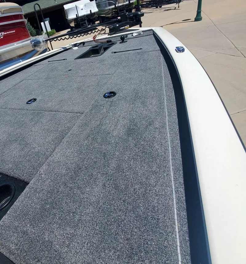 Slide: The Image of 2024 Tracker Pro Team 195 TXW Tournament Edition boat deck. - 2