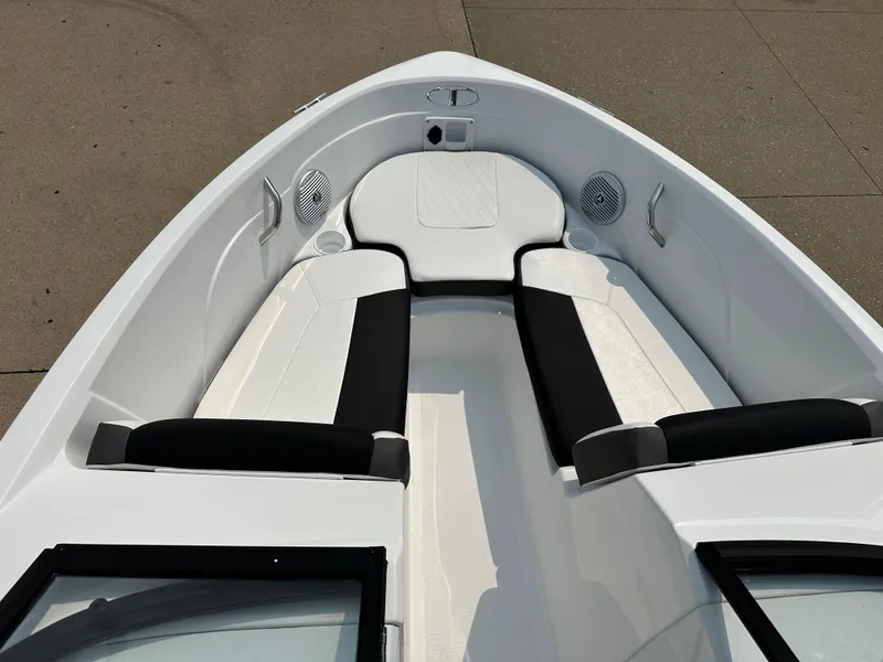 Slide: The Image of 2024 Tahoe 200 S boat interior with white and black seating. - 3