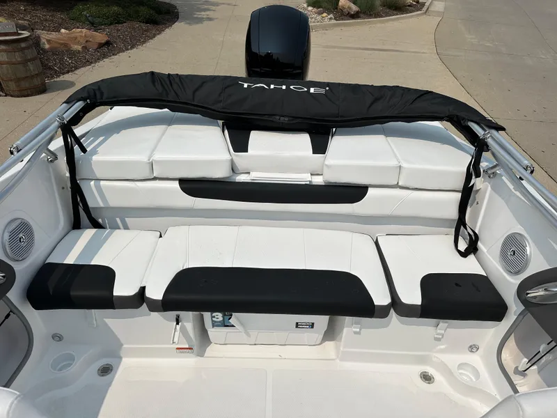 Slide: The Image of 2024 Tahoe 200 S boat interior with white and black seating. - 7