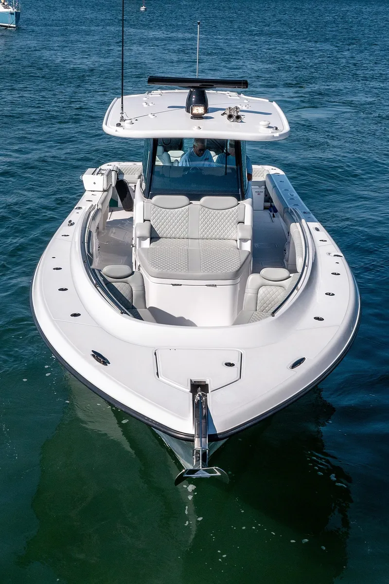 Slide: The Image of 2024 HCB 39 Speciale boat on water, front view. - 14