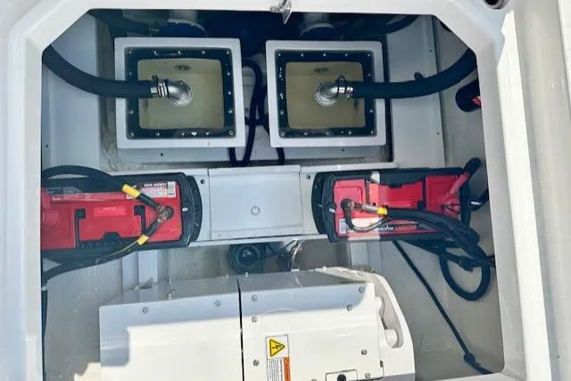 Slide: The Image of 2024 HCB 39 Speciale engine compartment with batteries and wiring. - 39