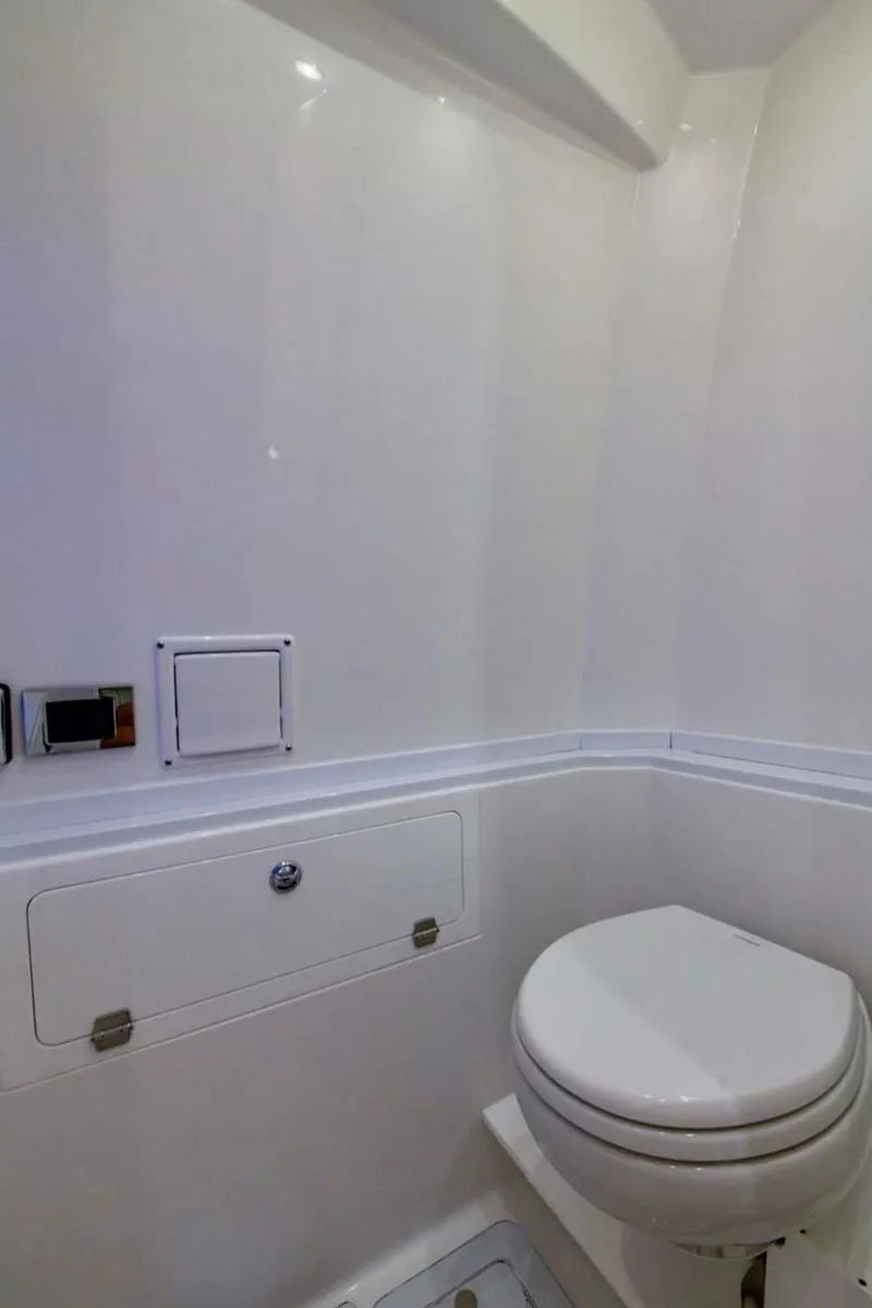 Slide: The Image of 2024 HCB 39 Speciale boat bathroom with modern white fixtures. - 43