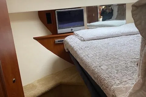 Slide: The Image of Bathroom in a 2007 Silverton 33 Convertible yacht with toilet and sink. - 31