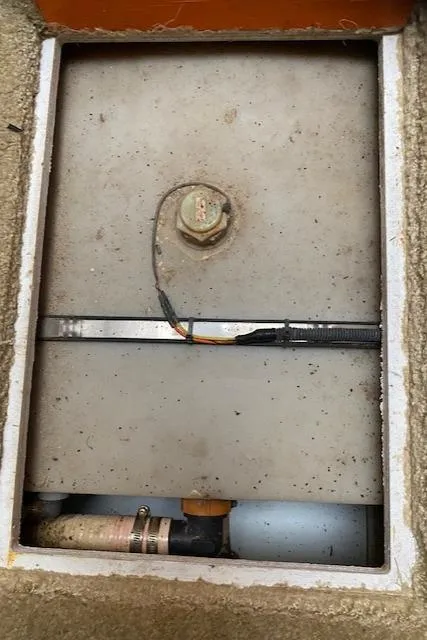 Slide: The Image of 2007 Silverton 33 Convertible engine room with fire extinguisher and wiring. - 39