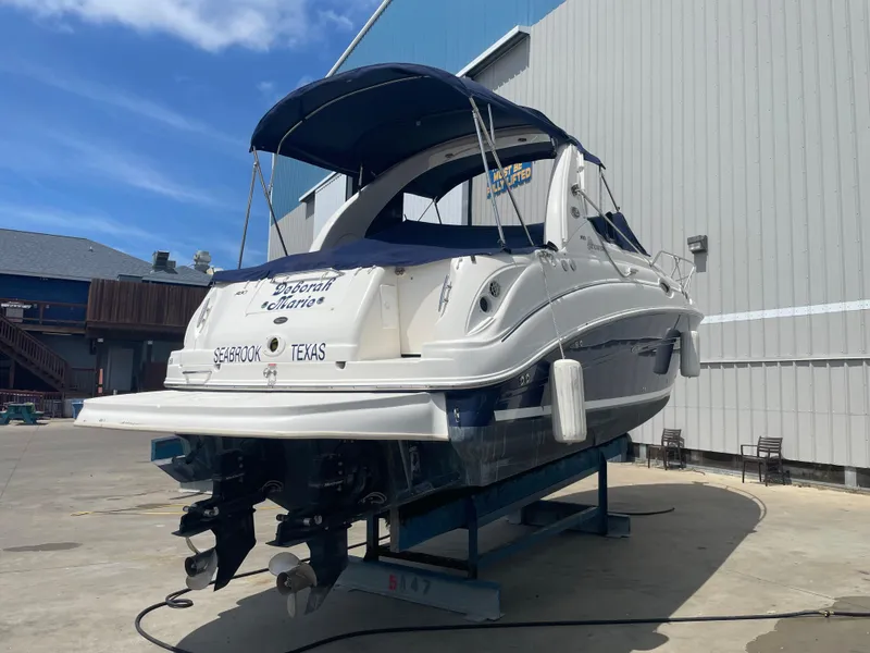 Slide: The Image of 2006 Sea Ray 280 Sundancer boat on a lift in Seabrook, Texas. - 35