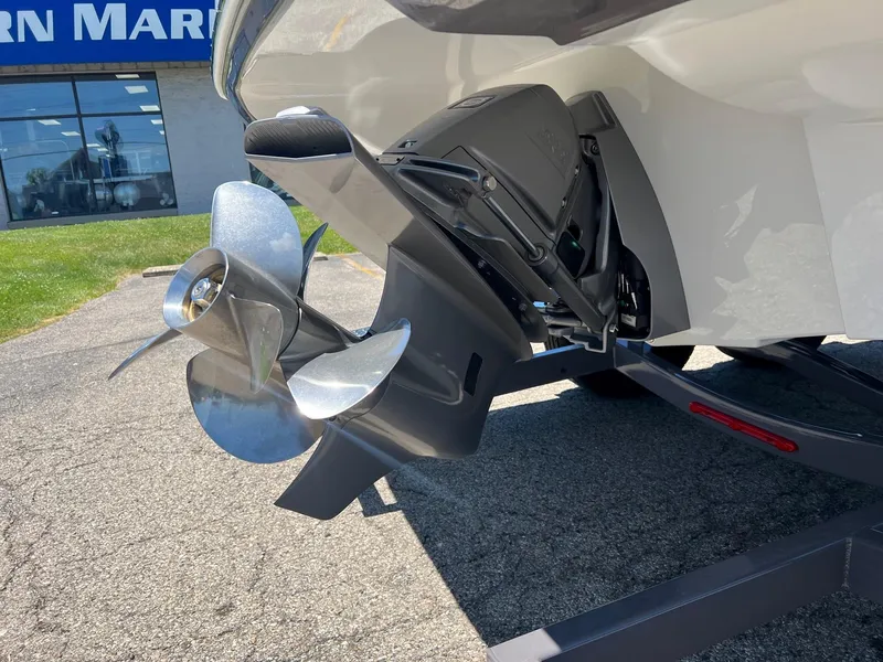 Slide: The Image of 2025 Crownline 220 SS boat propeller and stern drive close-up. - 8