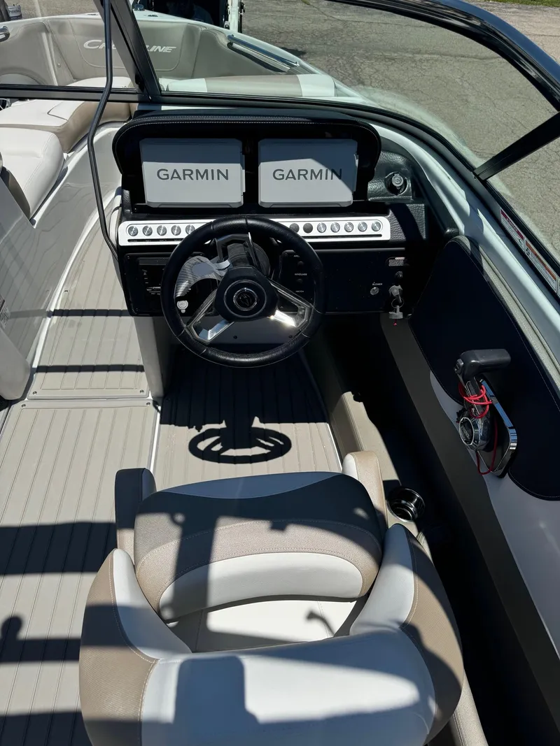 Slide: The Image of Engine compartment of 2025 Crownline 240 SS boat showing engine and components. - 12