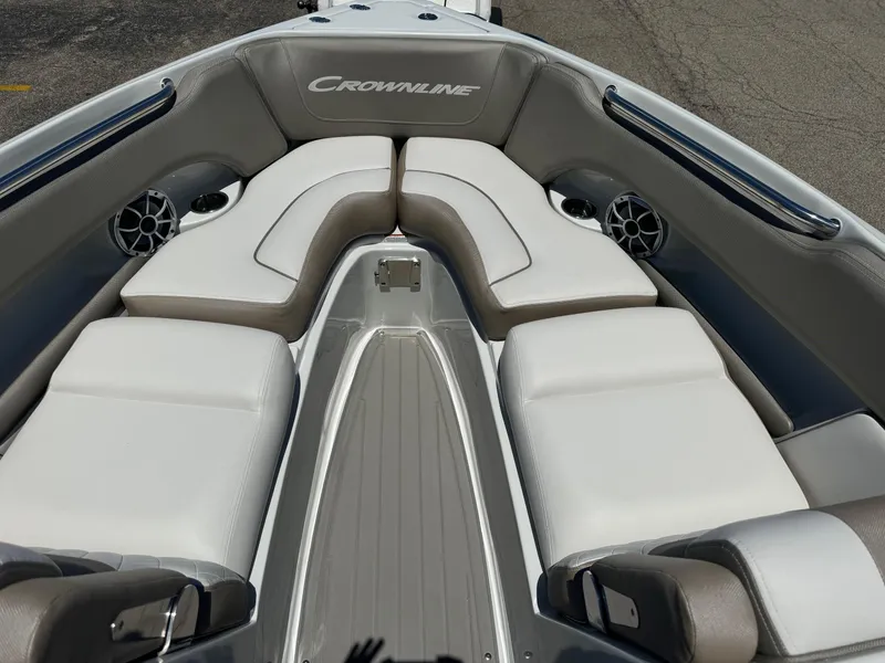 Slide: The Image of Crownline 240 SS 2025 boat interior with gray and white seating. - 16