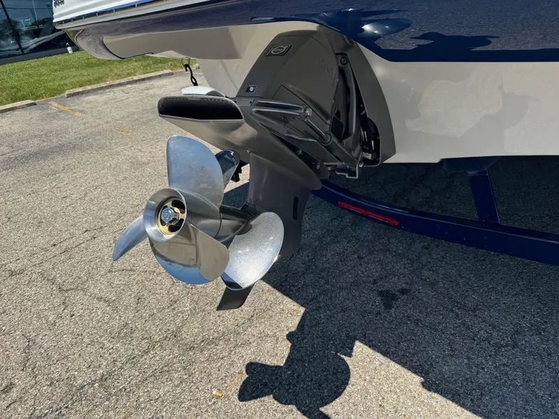 Slide: The Image of Crownline 240 SS 2025 boat dashboard with dual Garmin displays. - 7