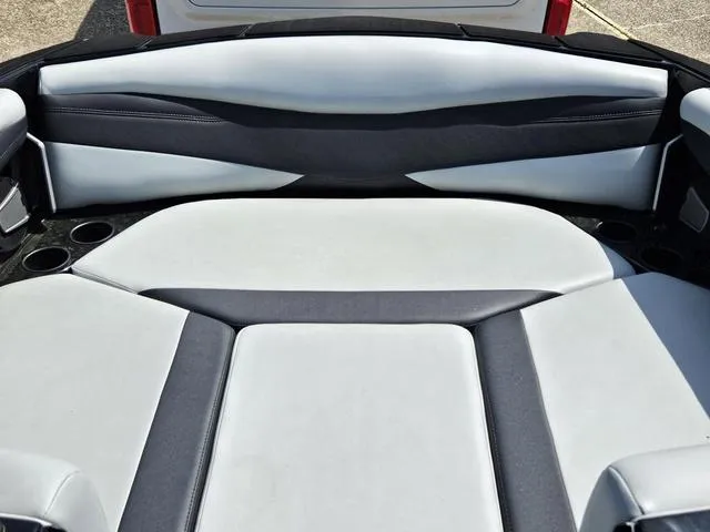 Slide: The Image of 2024 Axis Wake Research A225 boat interior with sleek, modern seating design. - 16