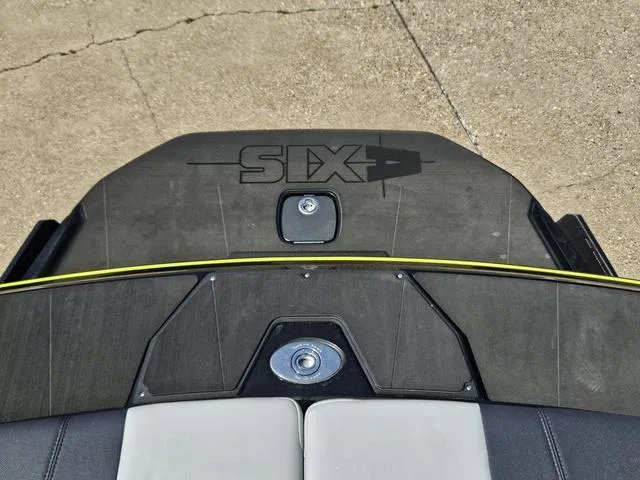 Slide: The Image of 2024 Axis Wake Research A225 boat deck with "SIX" logo, featuring sleek design and modern detailing. - 20