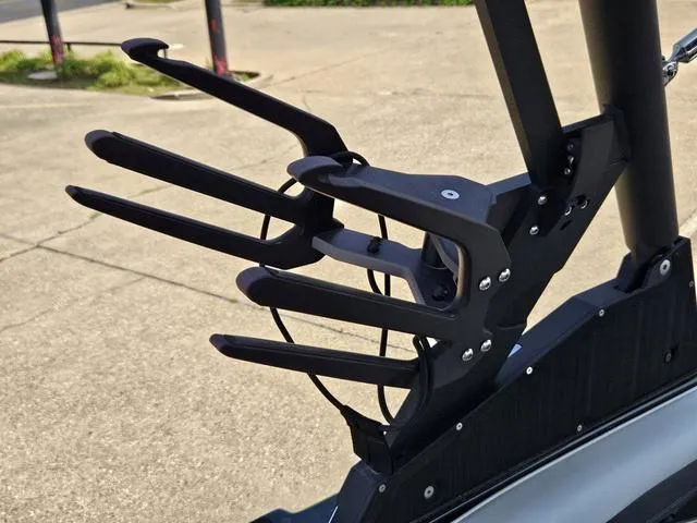 Slide: The Image of 2024 Axis Wake Research A225 boat wakeboard rack on a sunny day. - 36