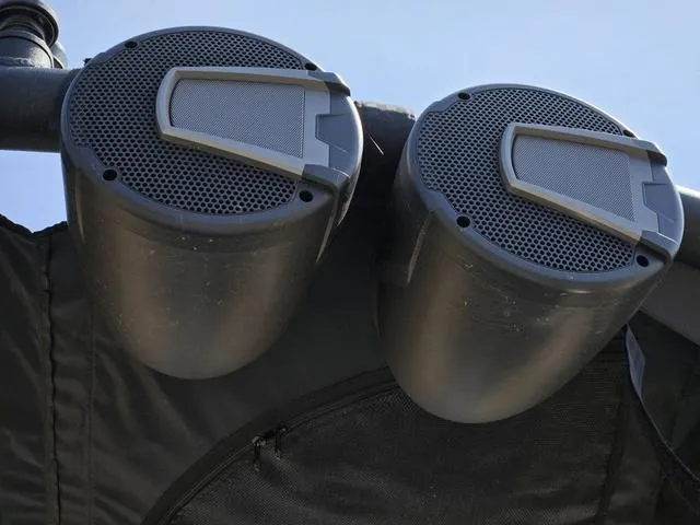 Slide: The Image of 2024 Axis Wake Research A225 boat speakers mounted on a wakeboard tower. - 39