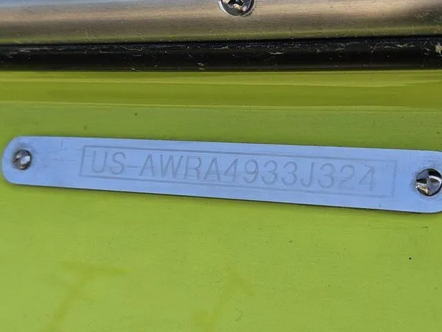 Slide: The Image of 2024 Axis Wake Research A225 boat identification plate with serial number. - 40