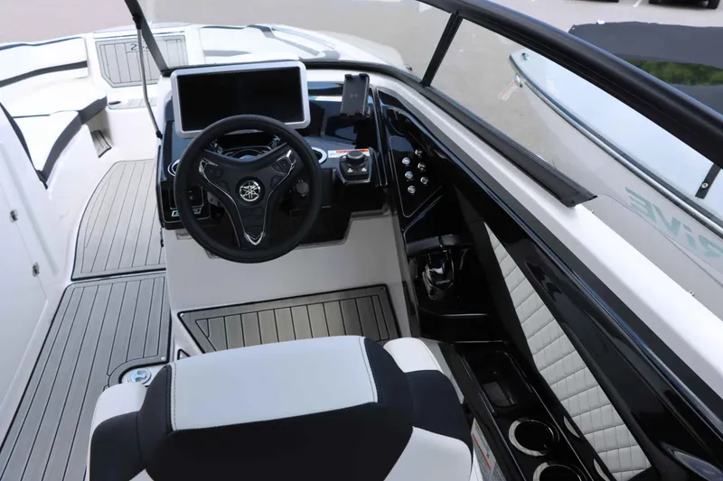 Slide: The Image of 2024 Yamaha Boats 252SD helm with modern controls and sleek design. - 10