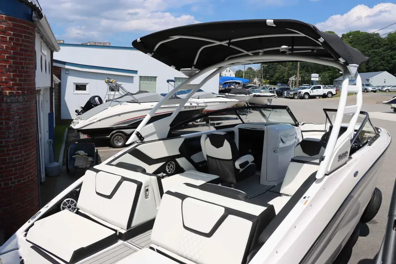 Slide: The Image of 2024 Yamaha Boats 252SD, luxury interior, docked at marina. - 6