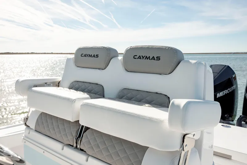 Slide: The Image of 2024 Caymas 281 HB boat seats with ocean backdrop. - 22
