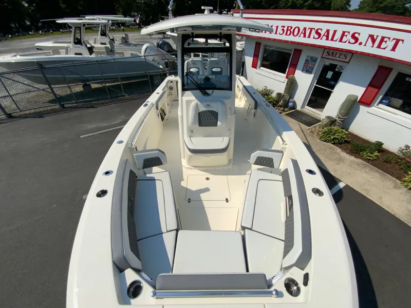 Slide: The Image of 2025 Cobia 265 CC center console boat at dealership. - 40