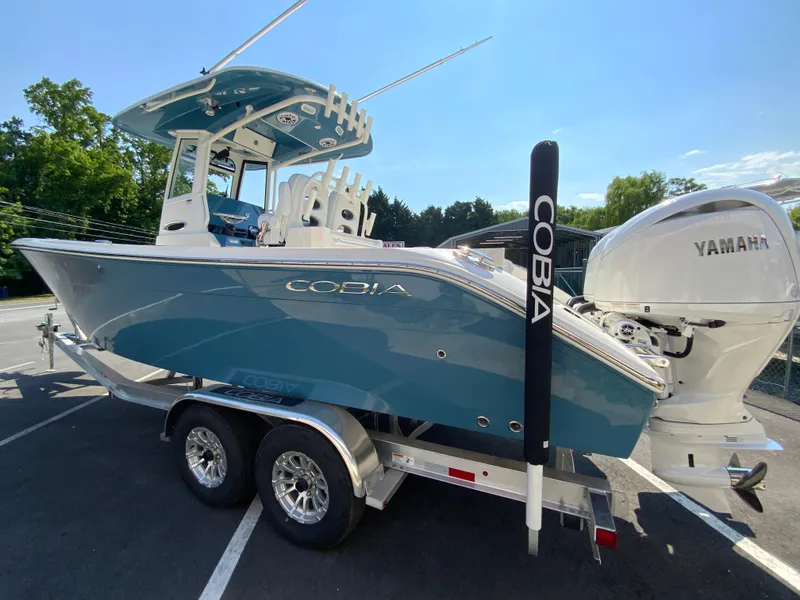Slide: The Image of 2025 Cobia 265 CC boat on trailer with Yamaha engine. - 8