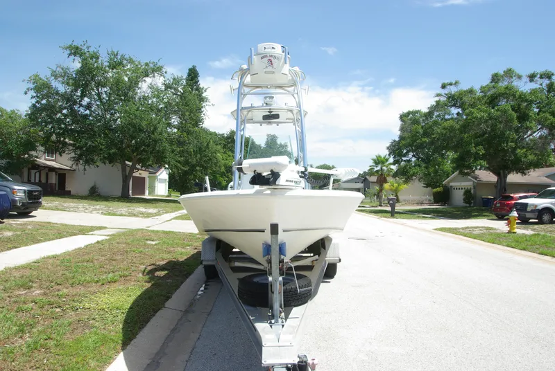 Slide: The Image of 2010 Cape Horn Center Console boat on a trailer in a suburban neighborhood. - 10