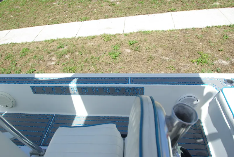 Slide: The Image of 2010 Cape Horn Center Console boat interior with seating and deck view. - 27