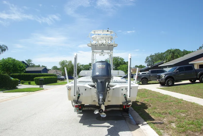 Slide: The Image of 2010 Cape Horn Center Console boat with 250 HP engine on a residential street. - 3