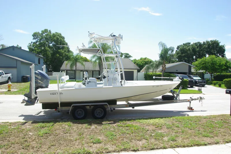 Slide: The Image of 2010 Cape Horn Center Console boat on a trailer in a suburban neighborhood. - 5