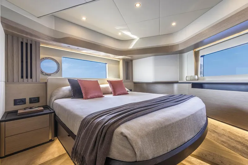 Slide: The Image of Luxurious bedroom interior of 2025 Absolute 53 Navetta yacht with modern design. - 12