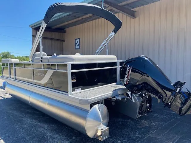 Slide: The Image of 2025 Godfrey 2086EX Xperience Cruise pontoon boat in showroom. - 2