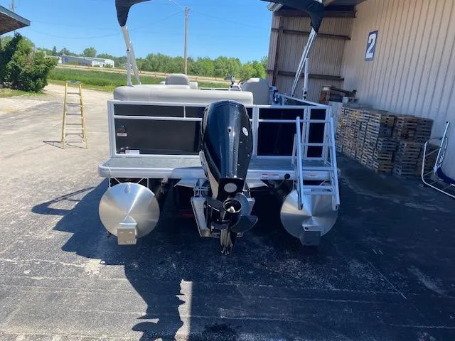 Slide: The Image of Godfrey 2086EX Xperience Cruise 2025 in showroom with Mercury engine. - 3