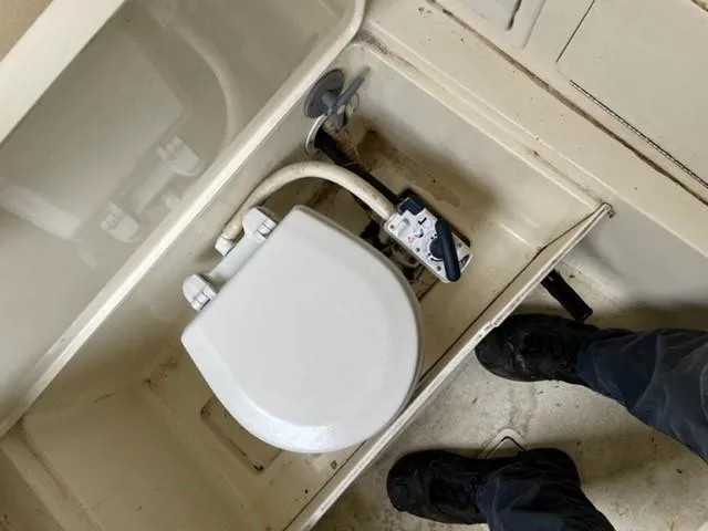 Slide: The Image of Boat toilet in a 2003 Scout 280 Sportfish. - 16
