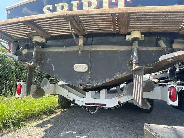 Slide: The Image of 1992 Blackfin 29 Combi boat on trailer, rear view showing propellers and rudders. - 3