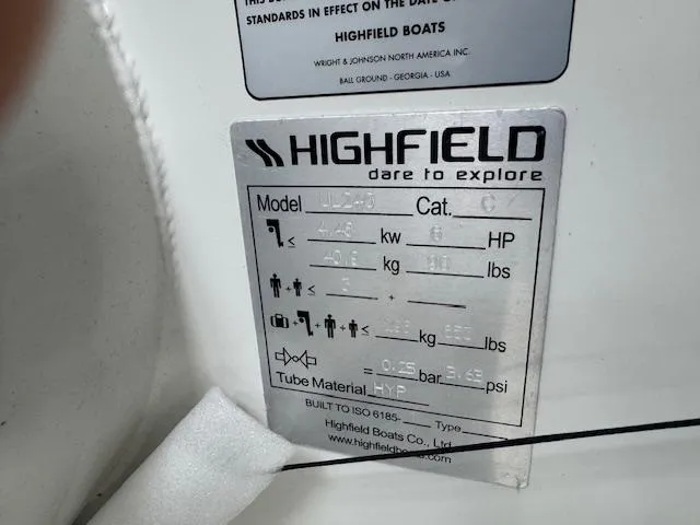 Slide: The Image of Highfield Ultralite 240SS 2025 model specifications plate with capacity and material details. - 2
