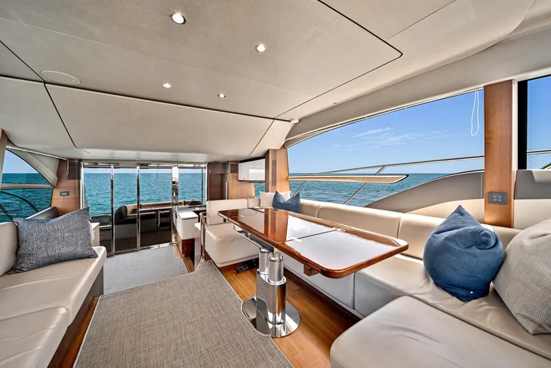 Slide: The Image of Luxurious interior of 2020 Princess F55 Flybridge yacht with ocean view. - 16