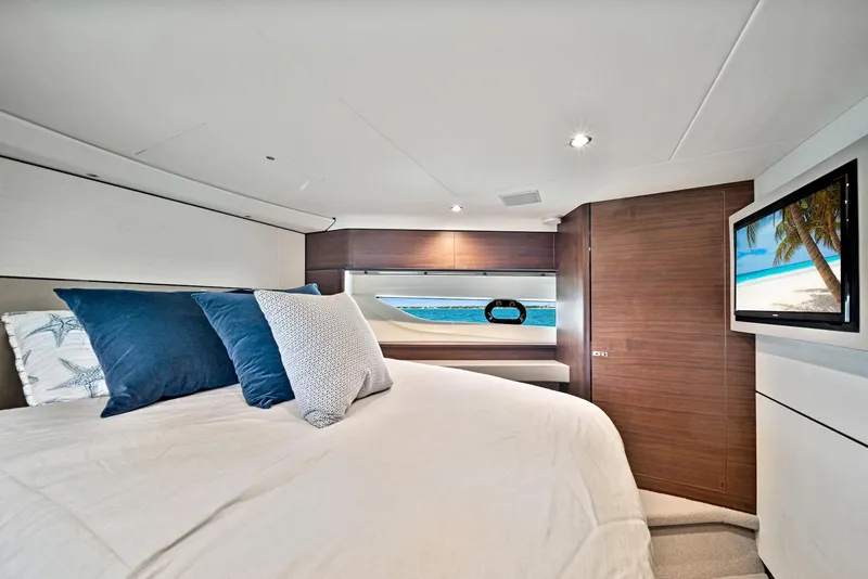 Slide: The Image of Luxurious bedroom in 2020 Princess F55 Flybridge yacht with ocean view and TV. - 37