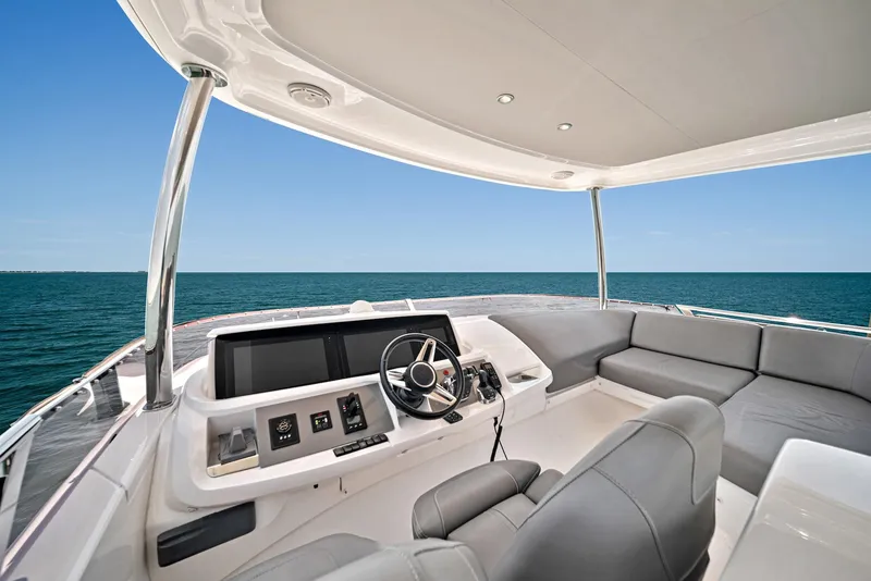 Slide: The Image of Flybridge of 2020 Princess F55 yacht with ocean view and modern seating. - 42