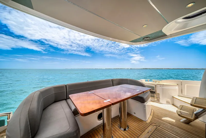 Slide: The Image of Princess F55 Flybridge 2020 yacht with ocean view and luxurious seating area. - 46