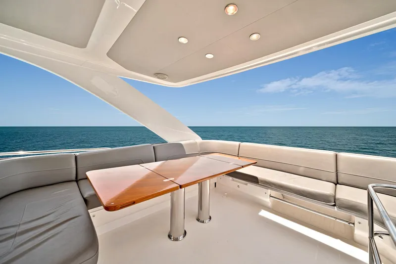 Slide: The Image of Flybridge seating area on a 2020 Princess F55 yacht with ocean view. - 47
