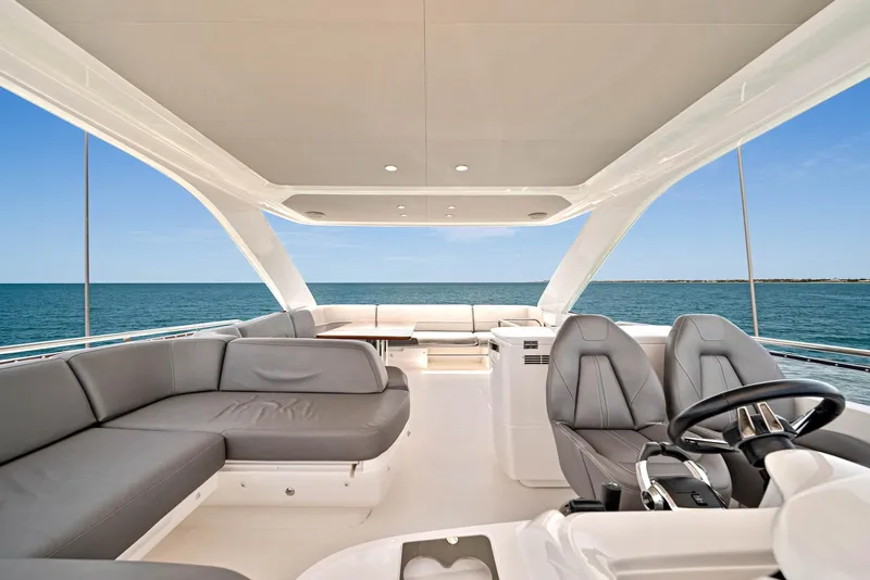Slide: The Image of Luxurious 2020 Princess F55 Flybridge yacht interior with ocean view. - 48